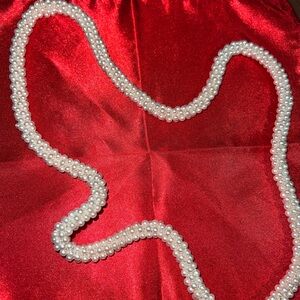 vintage pearl string necklace on a string